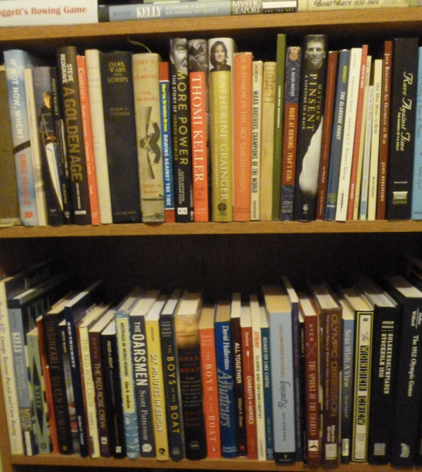 two book shelves full of rowing books.