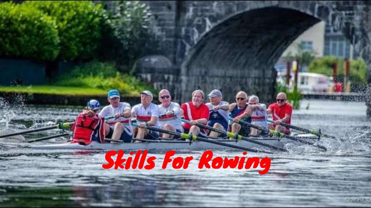 Mens masters rowing eight racing through a bridge.