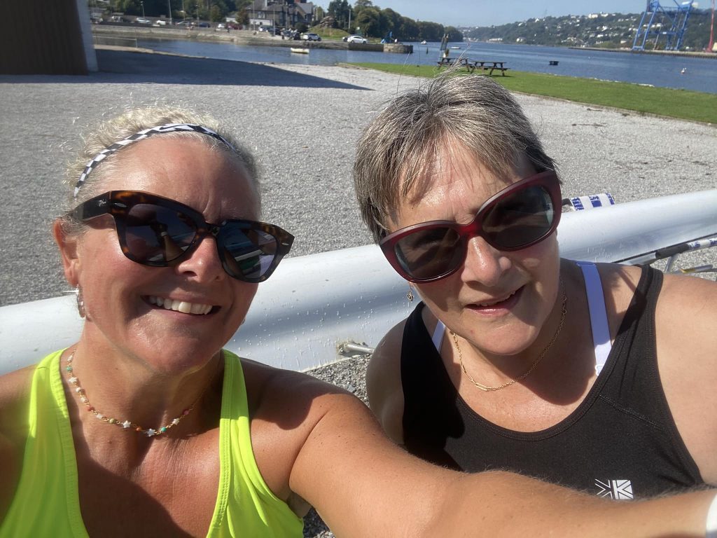 smiling women masters rowers, rowing in Ireland