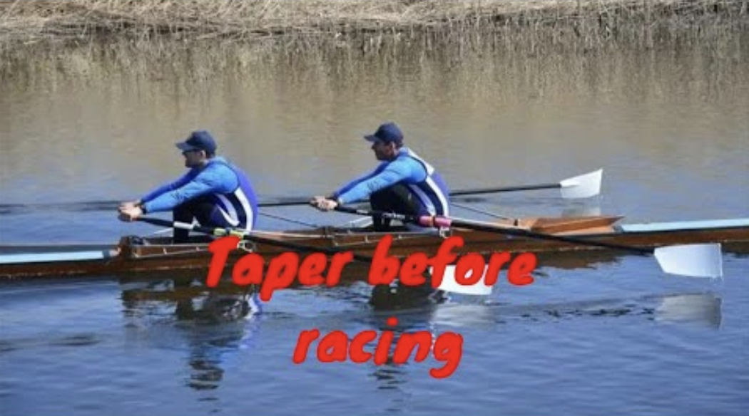 A double scull rowing crew in winter in matching blue uniforms
